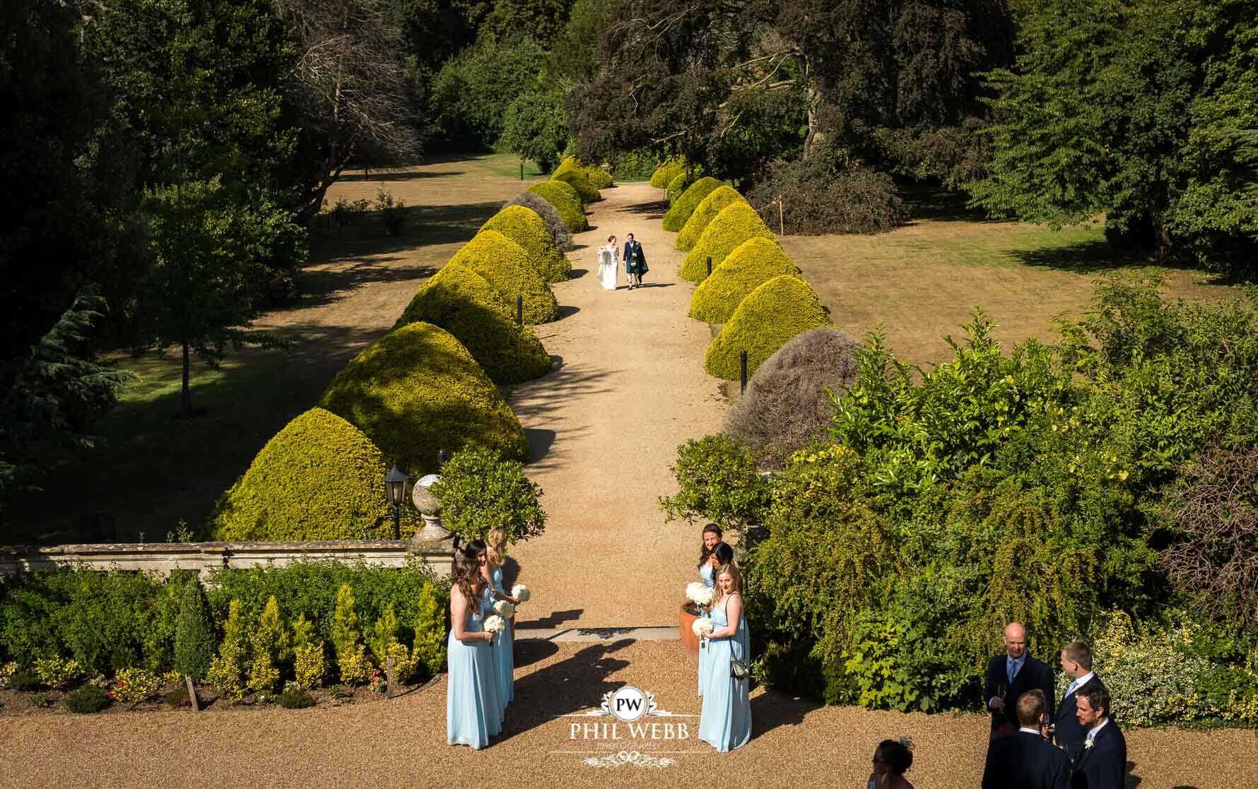 Manor by the Lake Wedding Photography bride and groom walking