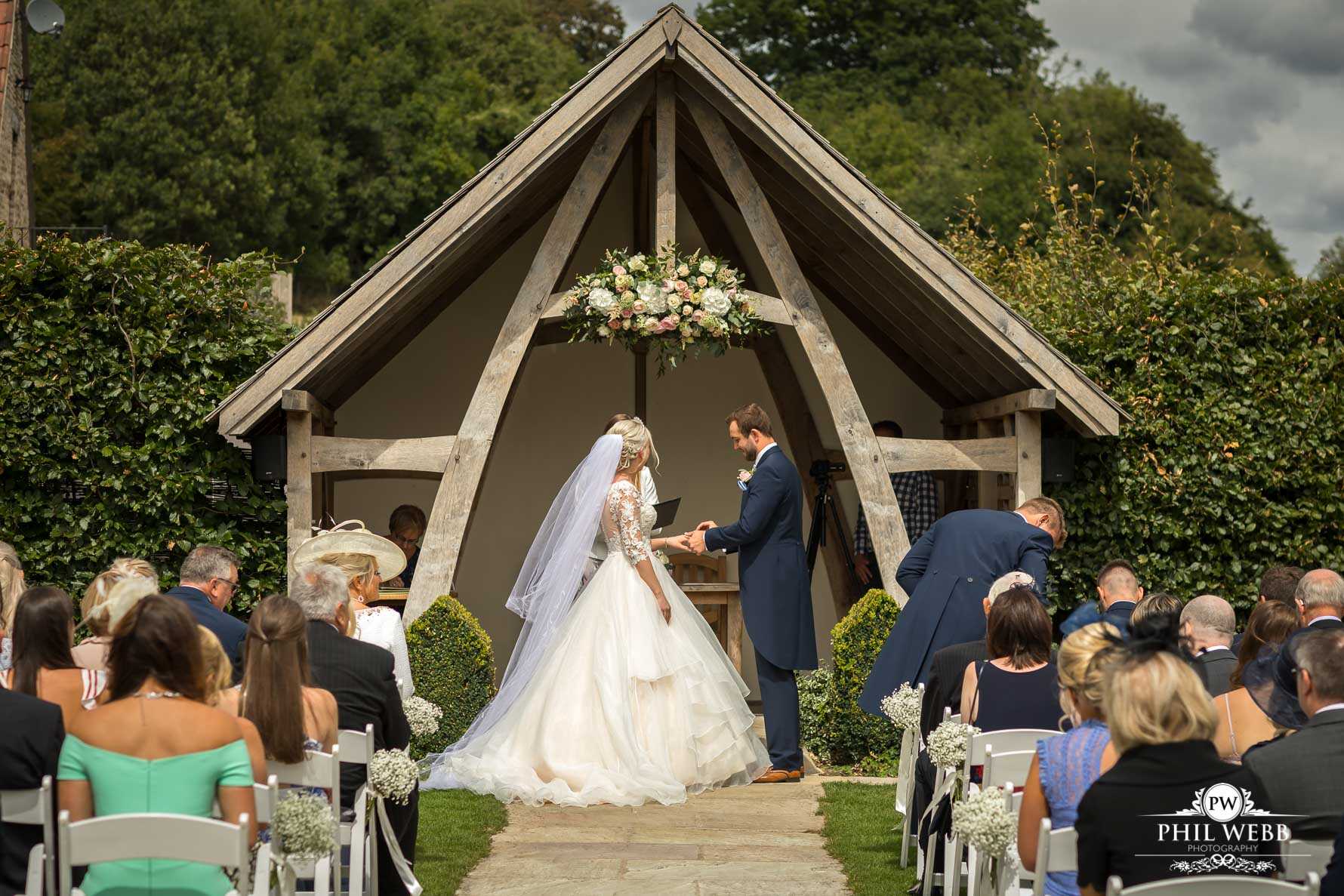 Kingscote Barn Wedding Photography Outdoor wedding ceremony