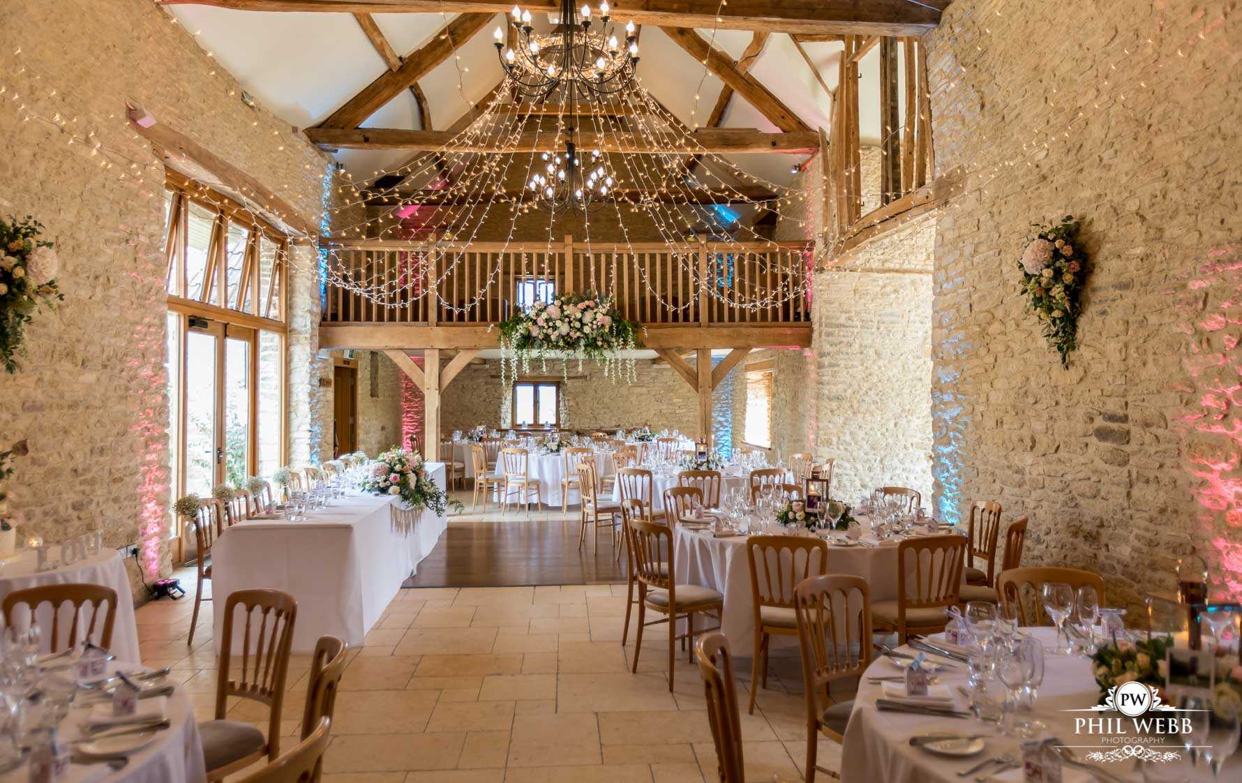 Kingscote Barn Wedding Photography wedding venue reception room