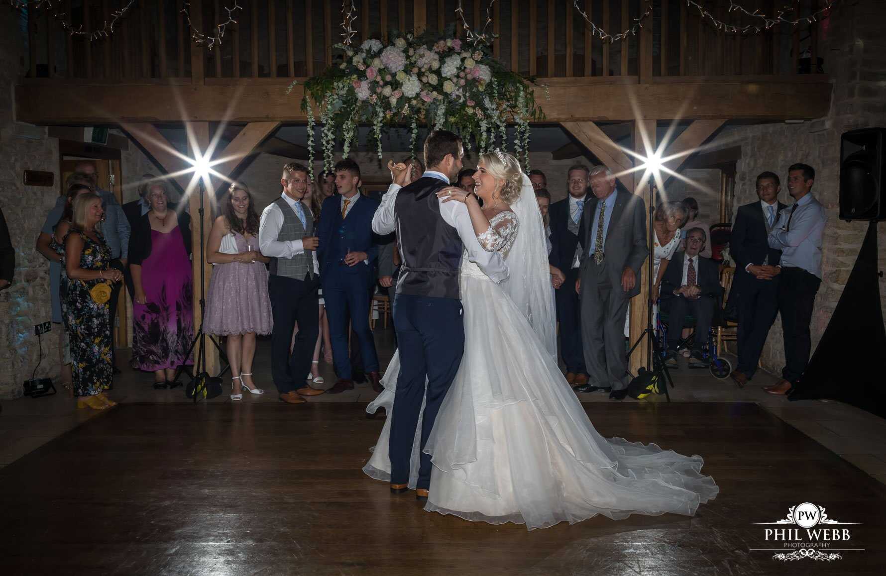 Kingscote Barn Wedding Photography bride and grooms first dance
