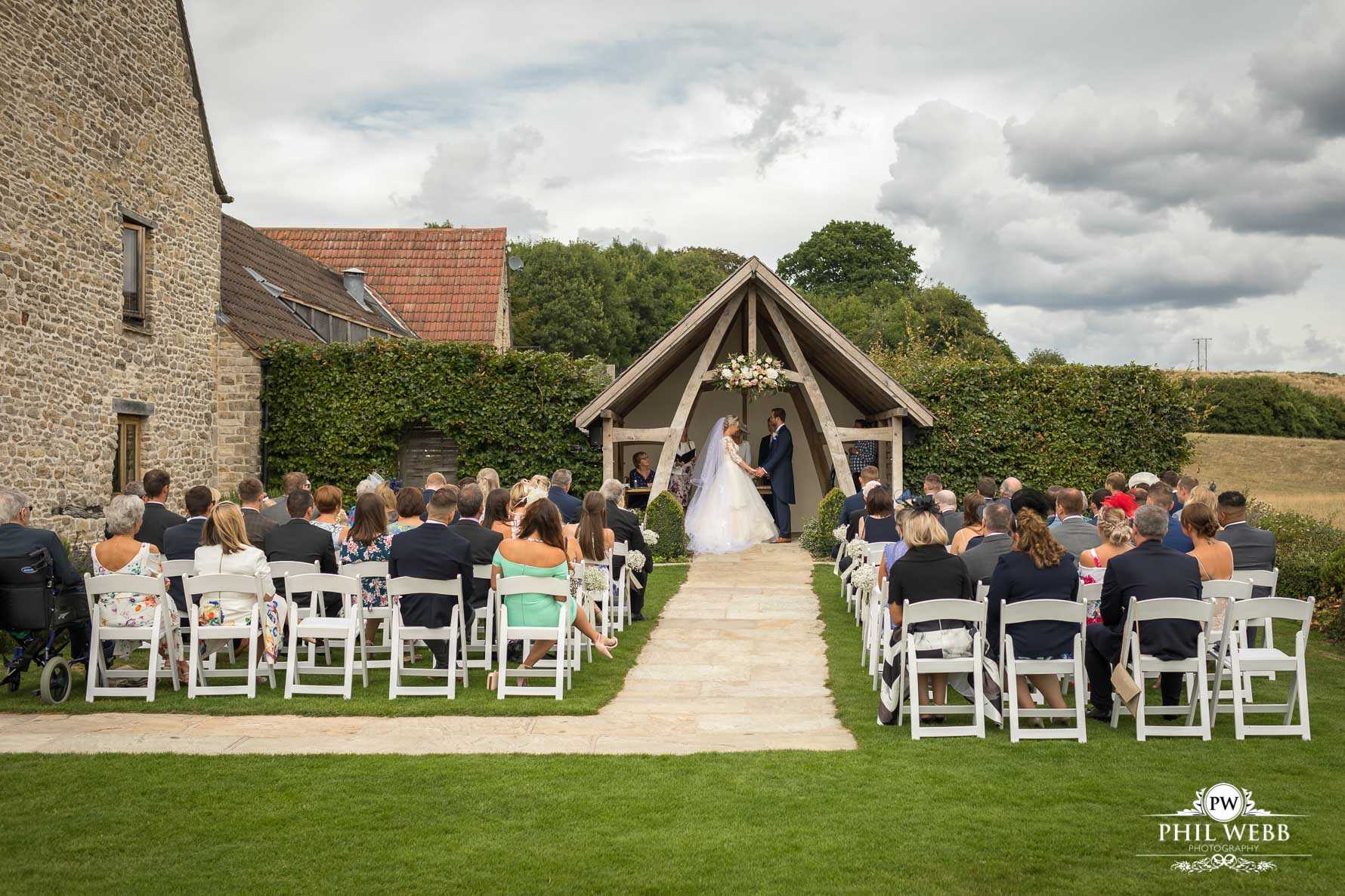 Kingscote Barn Wedding Photography Outdoor wedding ceremony
