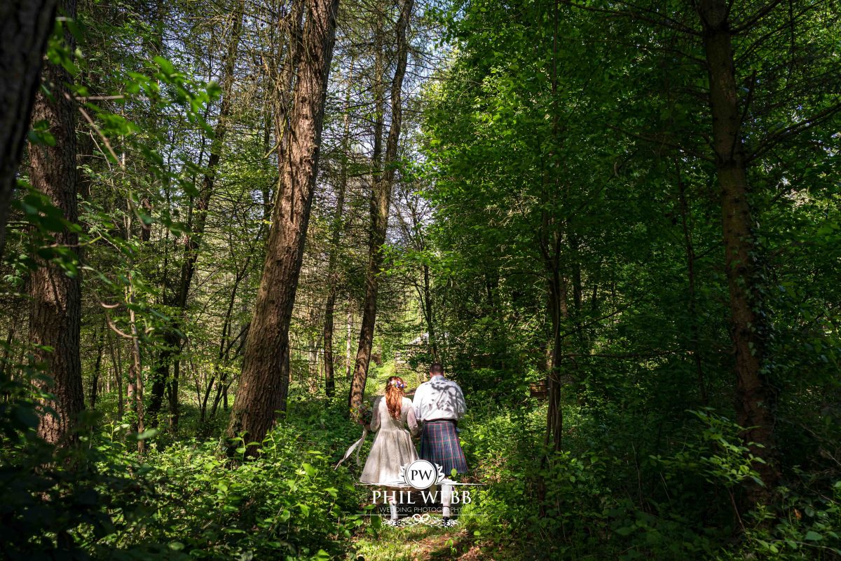 Enchanted Woodland Wedding Hereford bride and groom walking