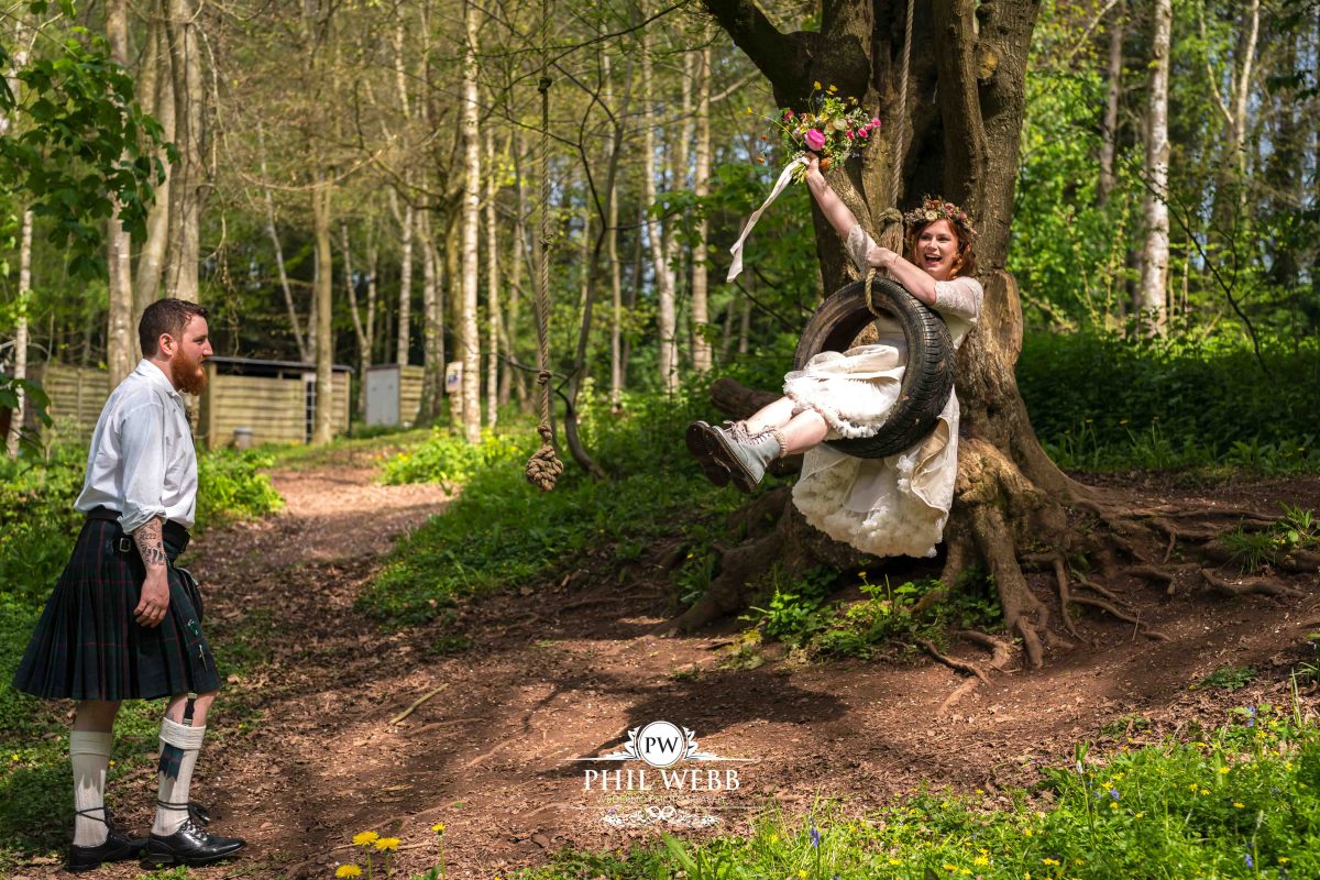 Enchanted Woodland Wedding Hereford bride on tyre swing