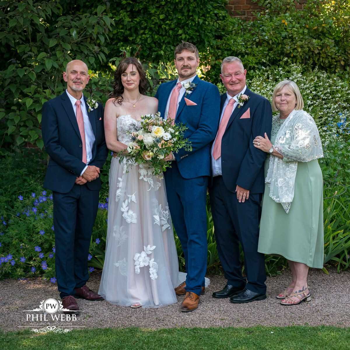 Pauntley Court Wedding Venue bride and groom group portrait