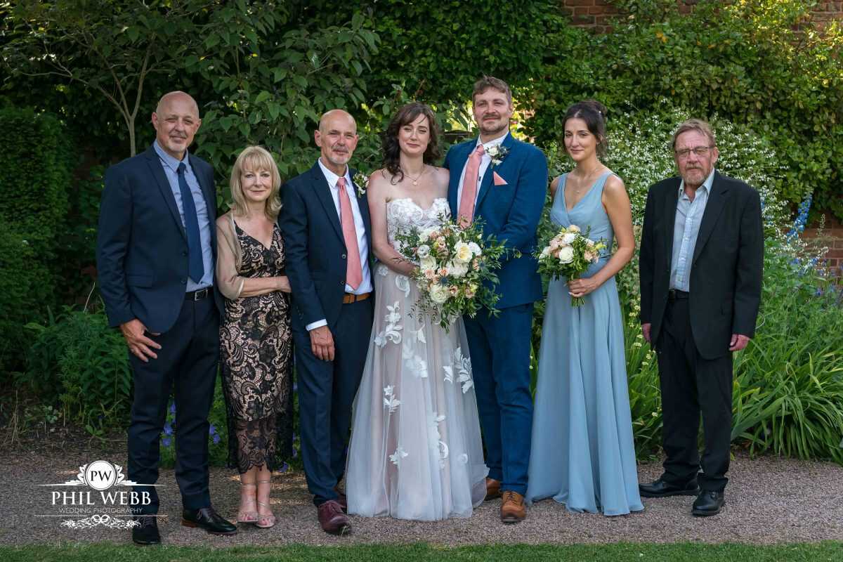 Pauntley Court Wedding Venue bride and groom group portrait