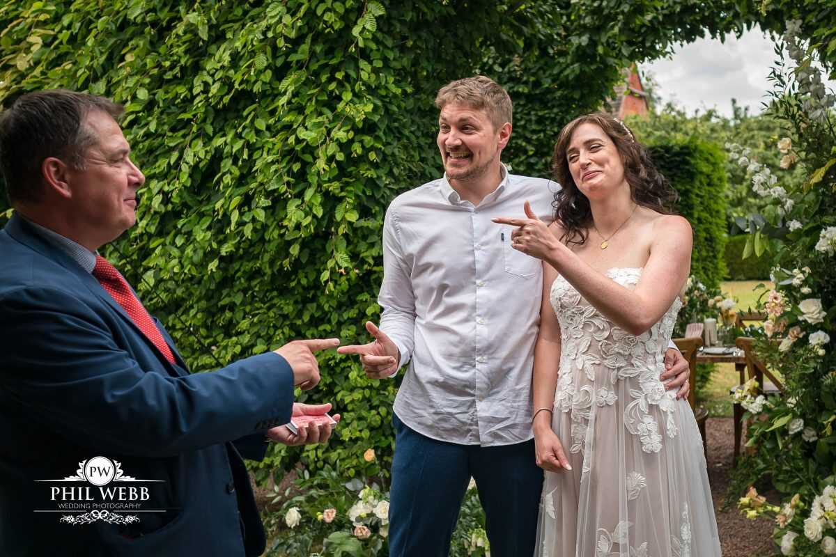 Pauntley Court Wedding Venue bride and groom with magician