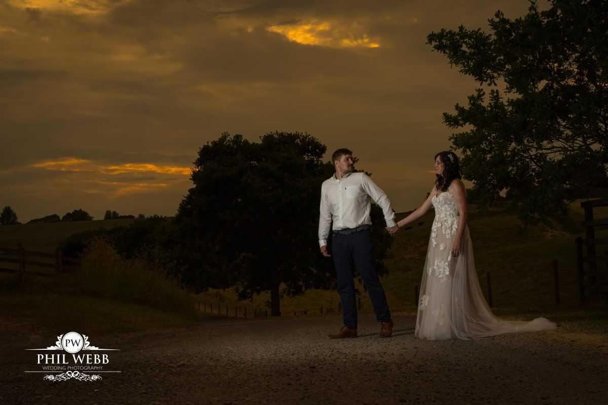 Pauntley Court Wedding Venue bride and groom sunset portrait