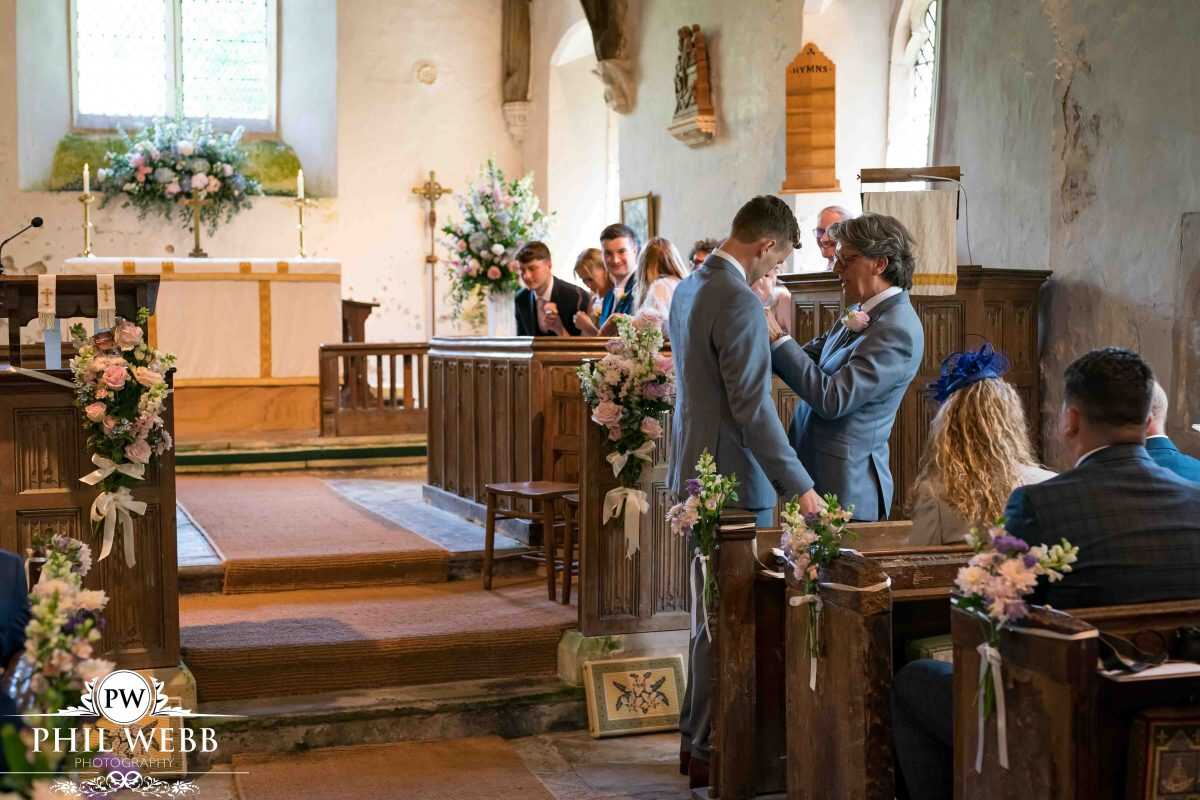 groom waiting for bride church wedding ceremony