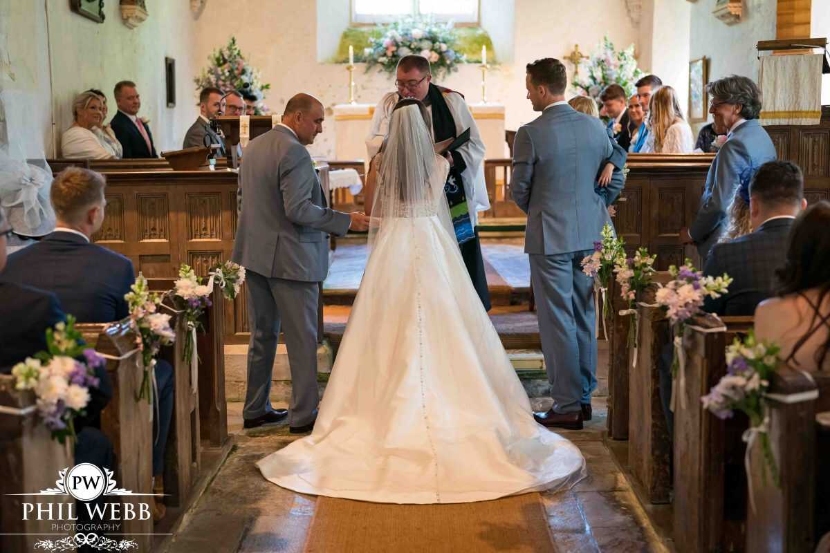 bride and groom in church wedding ceremony
