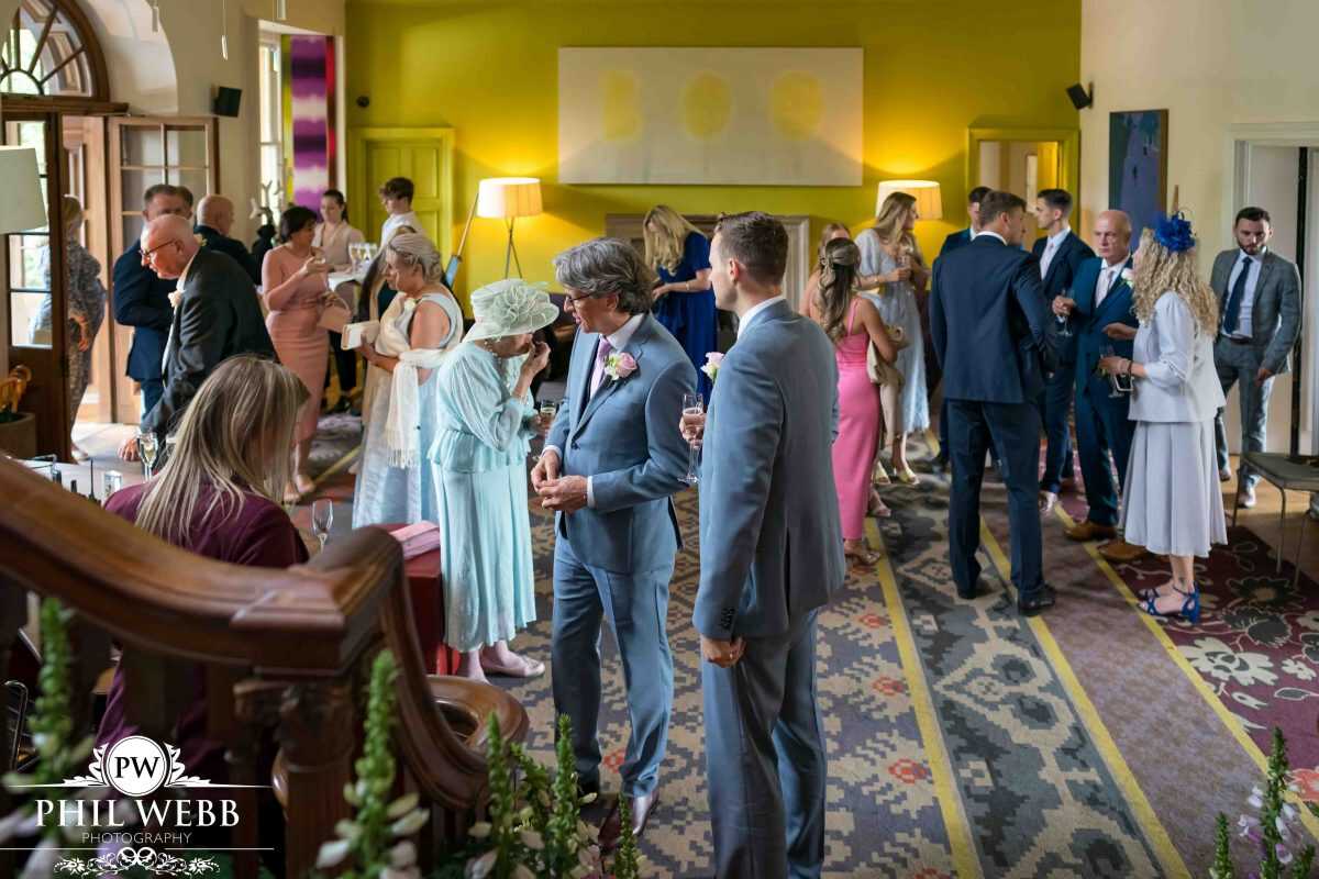 wedding reception at Cowley Manor by the lake