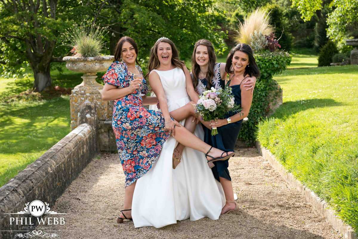 bride with her best friends at Cowley Manor