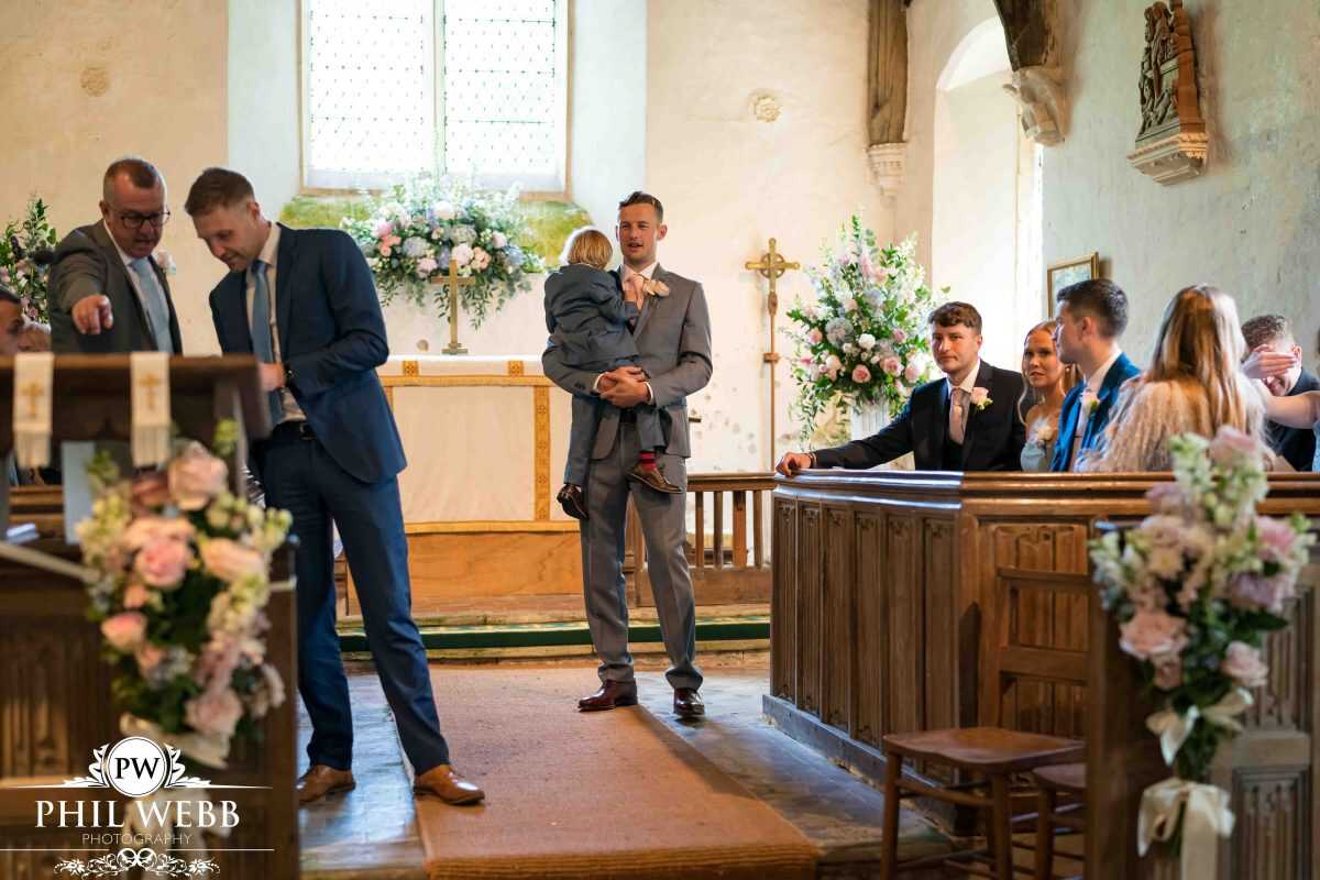groom waiting for bride church wedding ceremony