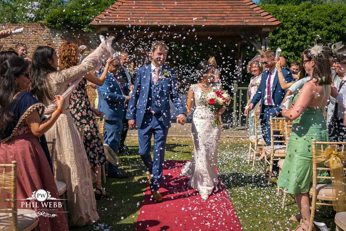 The Hatherley Manor Hotel Wedding photography outdoor wedding ceremony confetti