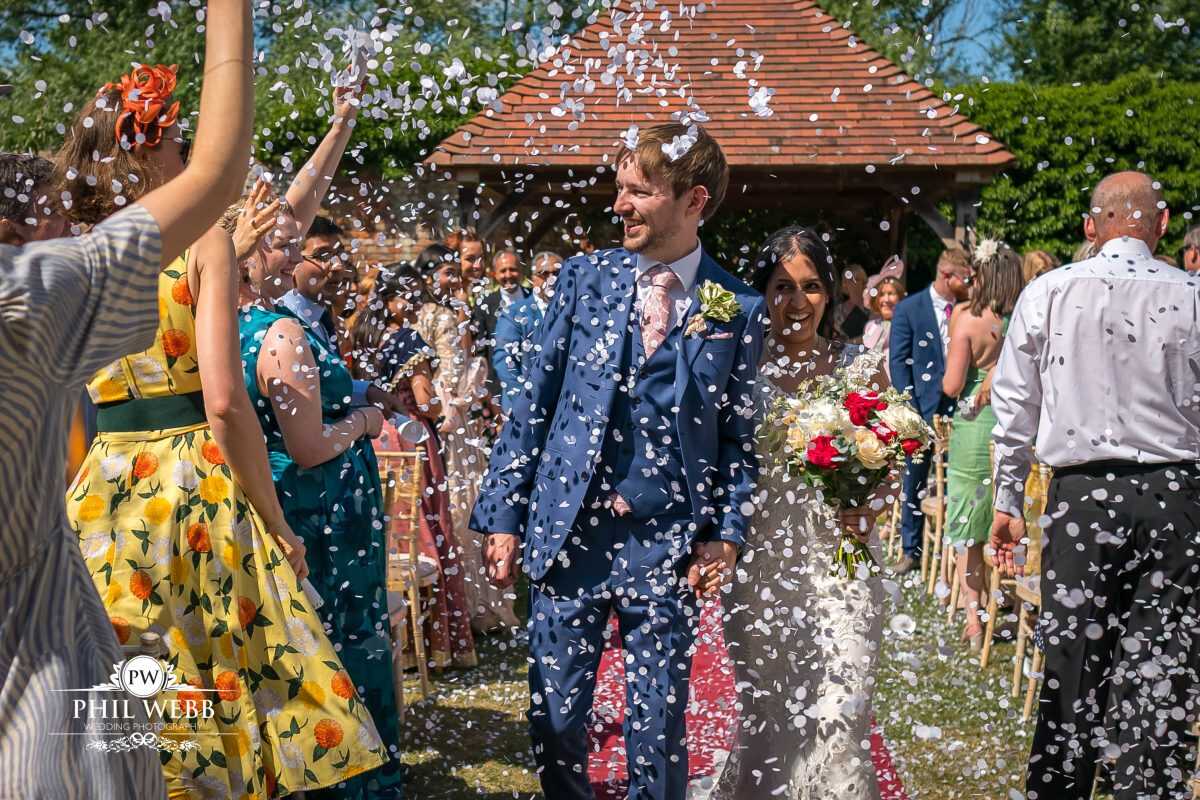 The Hatherley Manor Hotel Wedding photography outdoor wedding ceremony confetti