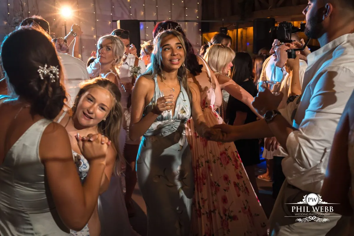Over barn at Over Farm Wedding Photography party dancing