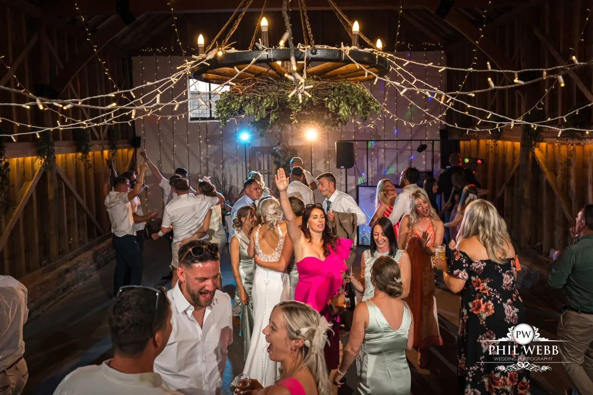 Over barn at Over Farm Wedding Photography party dancing