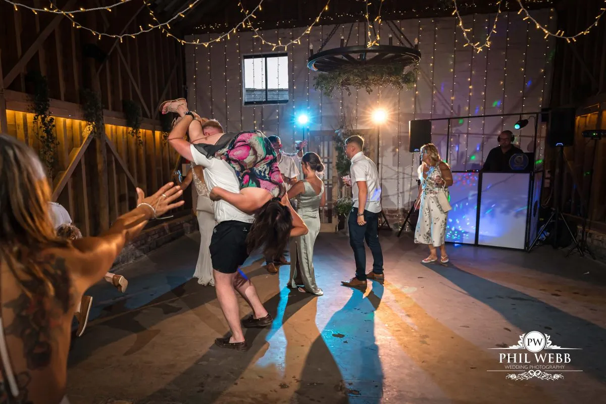 Over barn at Over Farm Wedding Photography party dancing