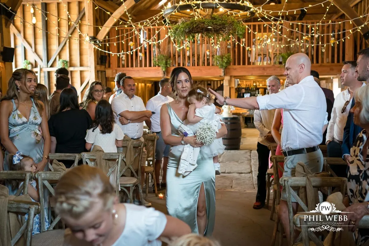 Over barn at Over Farm Wedding Photography bride and groom indoor ceremony