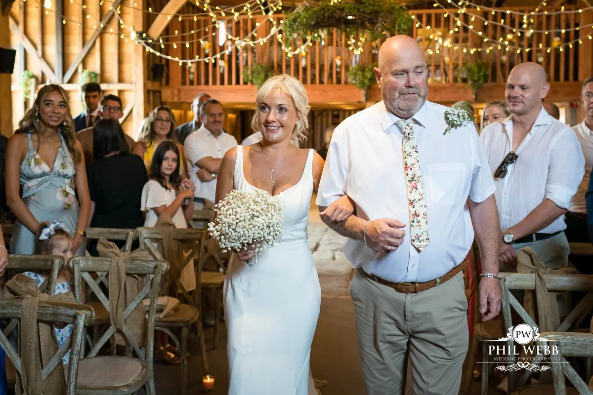 Over barn at Over Farm Wedding Photography bride and groom indoor ceremony