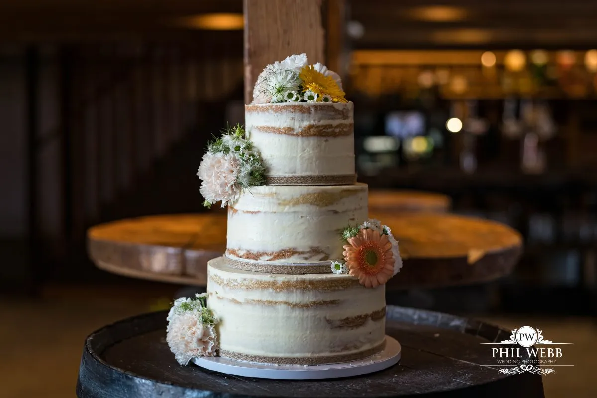 Over barn at Over Farm Wedding Photography wedding cake