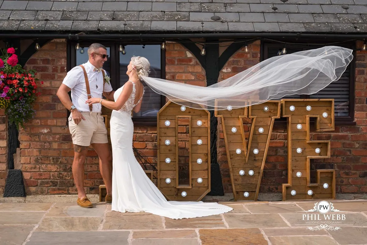 Over barn at Over Farm Wedding Photography bride and groom portrait