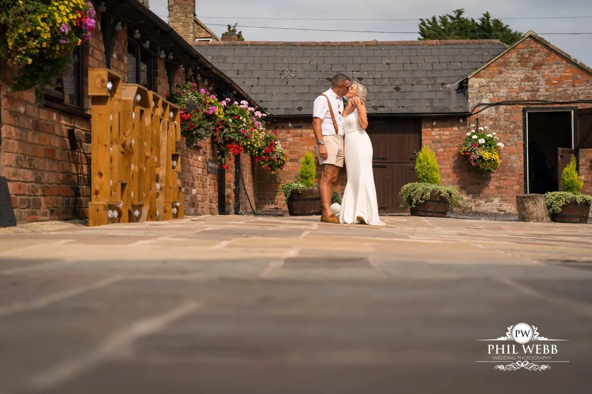 Over barn at Over Farm Wedding Photography bride and groom portrait