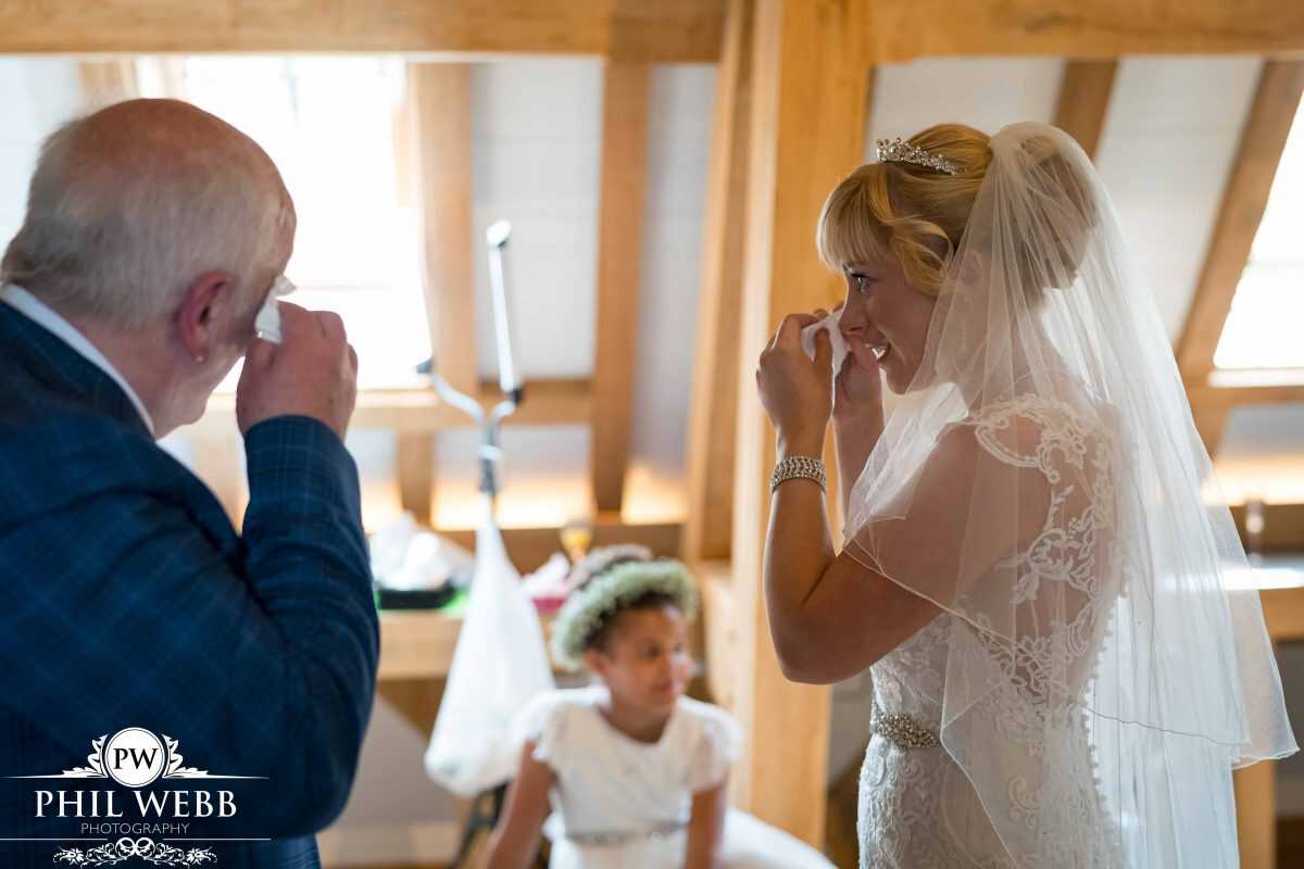 bride prep at Red House Barns Wedding Venue dad and bride crying