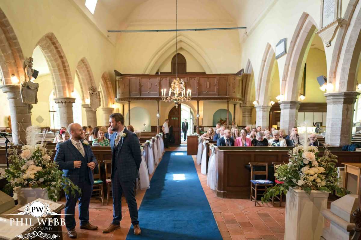 groom waiting for bride at church
