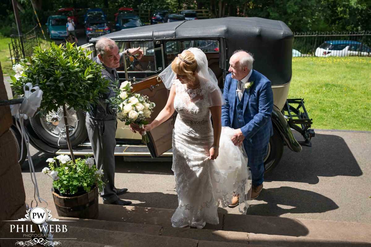 bride arriving at church for wedding ceremony