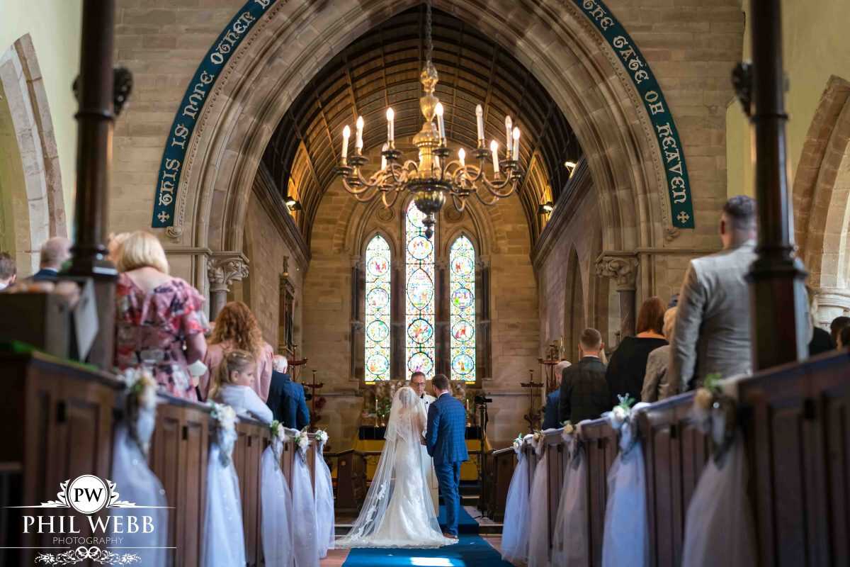 bride and groom wedding ceremony in church