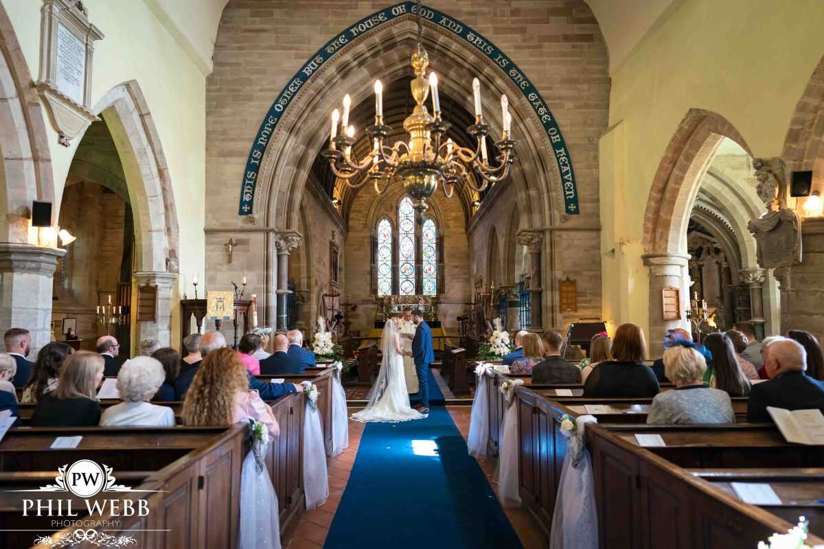 bride and groom wedding ceremony in church