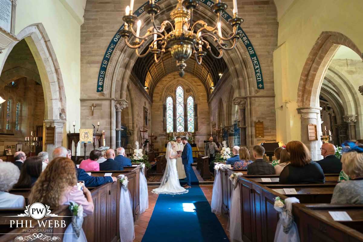 bride and groom wedding ceremony in church