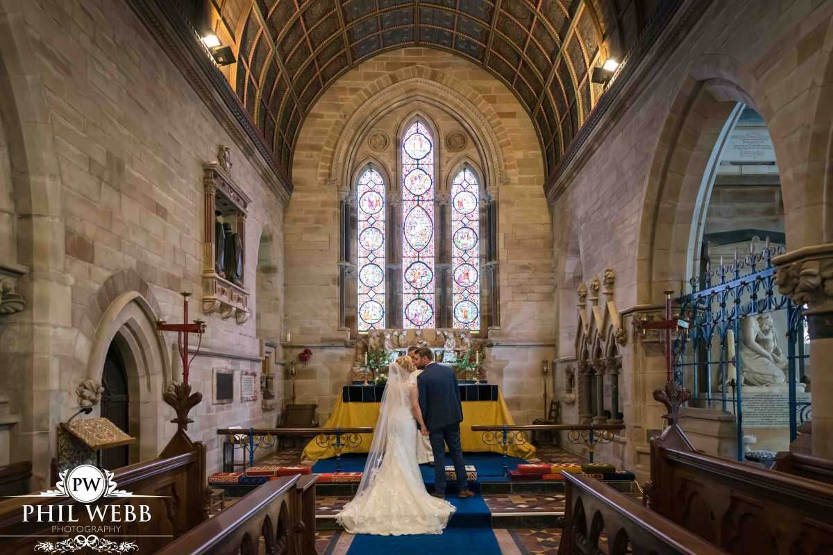bride and groom wedding ceremony in church walking down the aisle