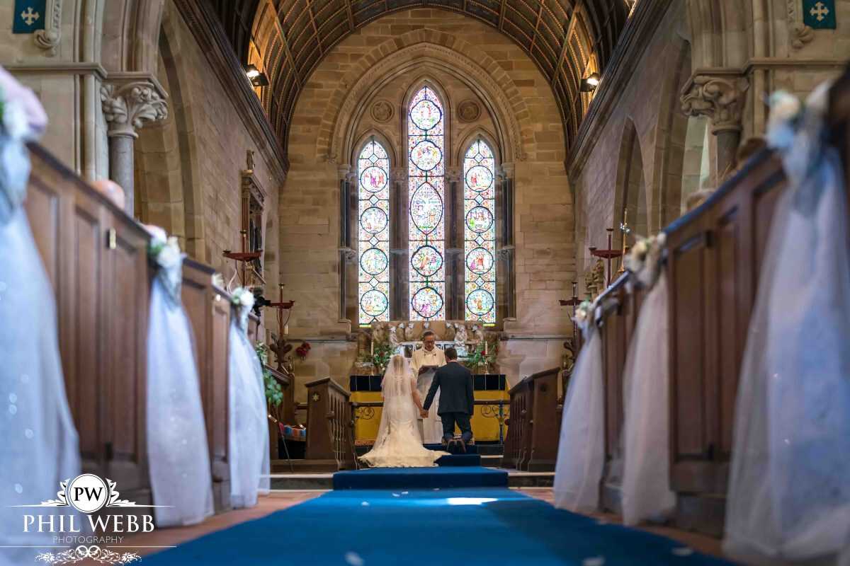 bride and groom wedding ceremony in church