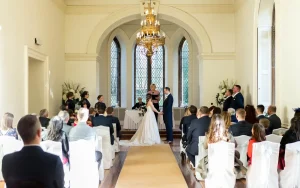 Clearwell Castle Wedding Photography Indoor wedding ceremony