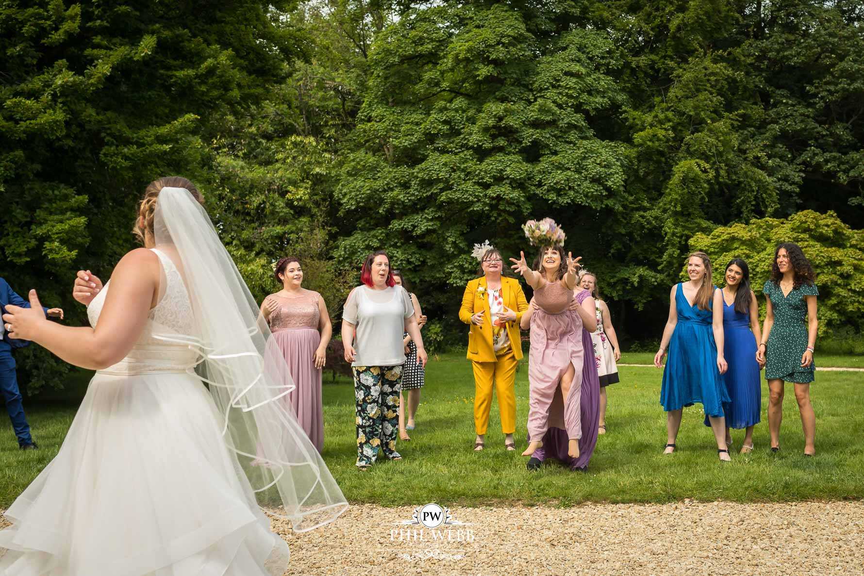 The Matara Centre Wedding Photography catching bouquet