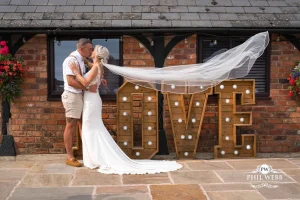 Over barn at Over Farm Wedding Photography bride and groom portrait